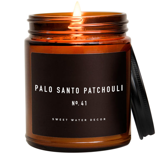 Sweet Water Decor Palo Santo Patchouli Candle | Vanilla, Musk, Sandalwood, Patchouli Scented Soy Candles for Home | Gifts for Women, Men, Housewarming | 9oz Amber Jar, 40 Hour Burn Time