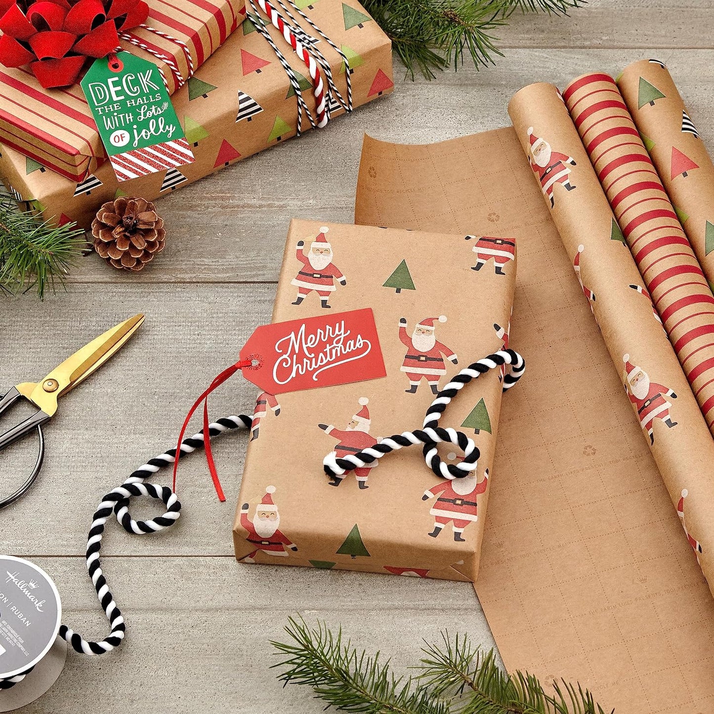 Hallmark Recyclable Christmas Wrapping Paper with Cut Lines on Reverse (3 Rolls: 90 sq. ft. ttl) Kraft Brown with Santas, Green Trees, Red Stripes